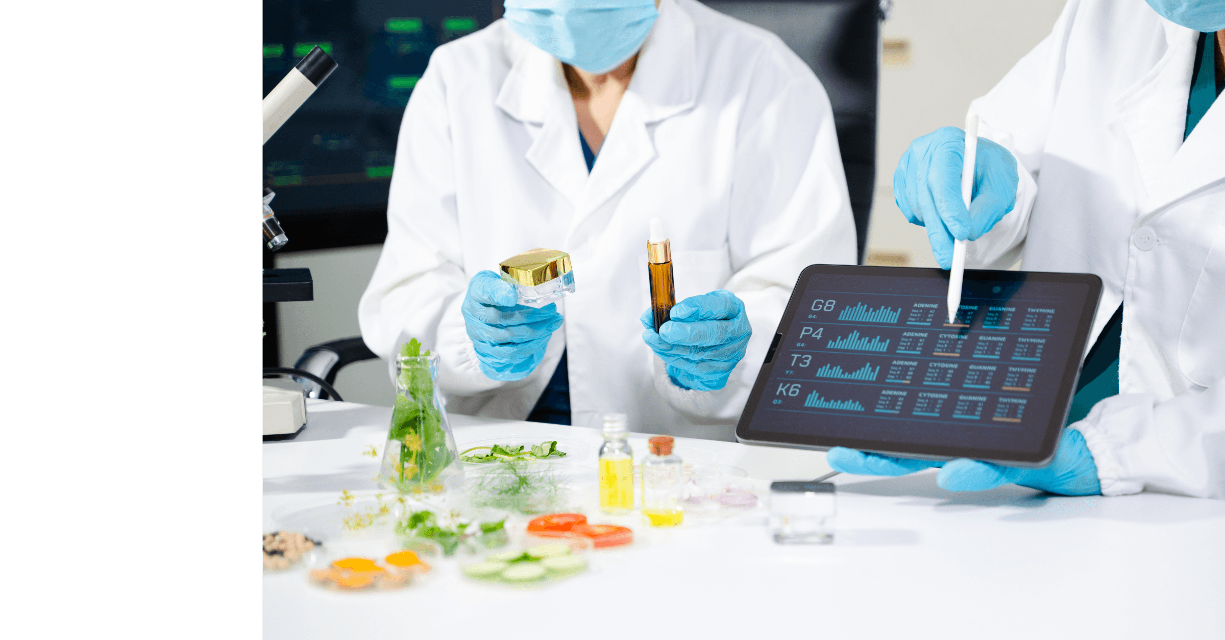 Formulation scientists assessing product samples and data in a laboratory