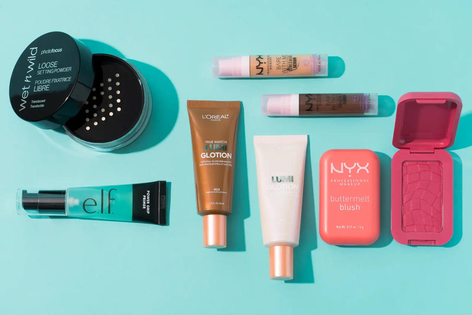 Skincare and makeup products laid flat